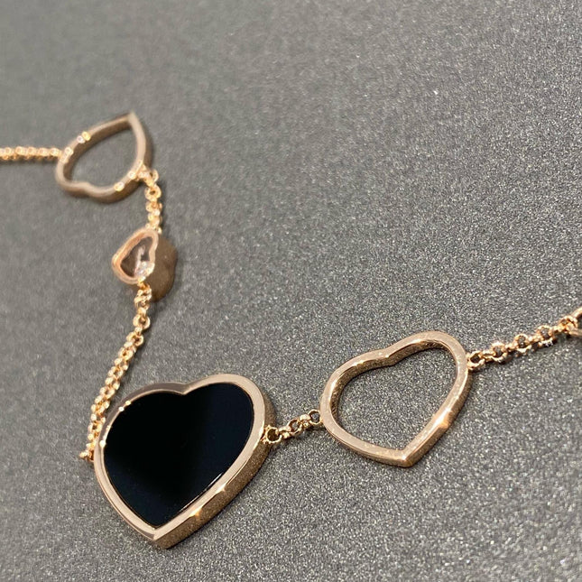HAPPY HEART ONYX PINK GOLD BRACELET