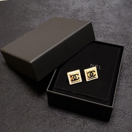 CC LIGHT GOLD AND WHITE ENAMEL SQUARE EARRINGS