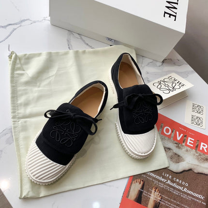 LOEWE 26S ANAGRAM FLAP SNEAKERS IN BLACK CANVAS