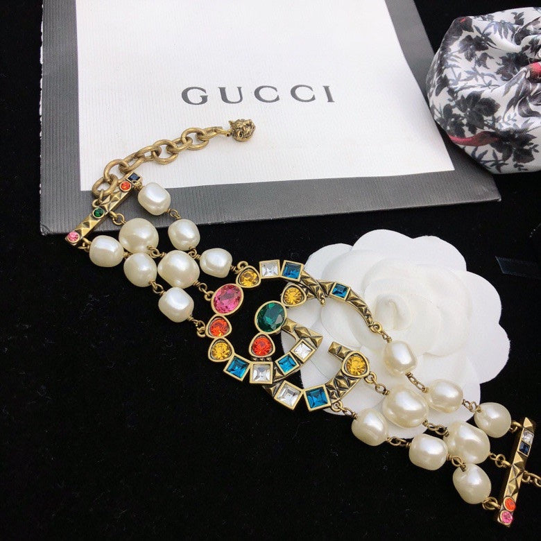 GUCCI 26S GG MULTICOLOR GEM PEARL CHAIN BRACELET IN GOLD TONE METAL 624209