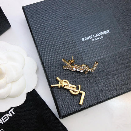 YSL 26S BAGUETTE CRYSTAL LOGO DROP EARRINGS IN GOLD TONE METAL 629136