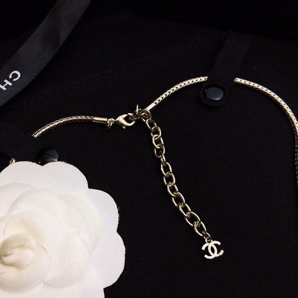 CHANEL 26S CHANEL CC LOGO MADEMOISELLE ROUND NECKLACE IN GOLD METAL 633322