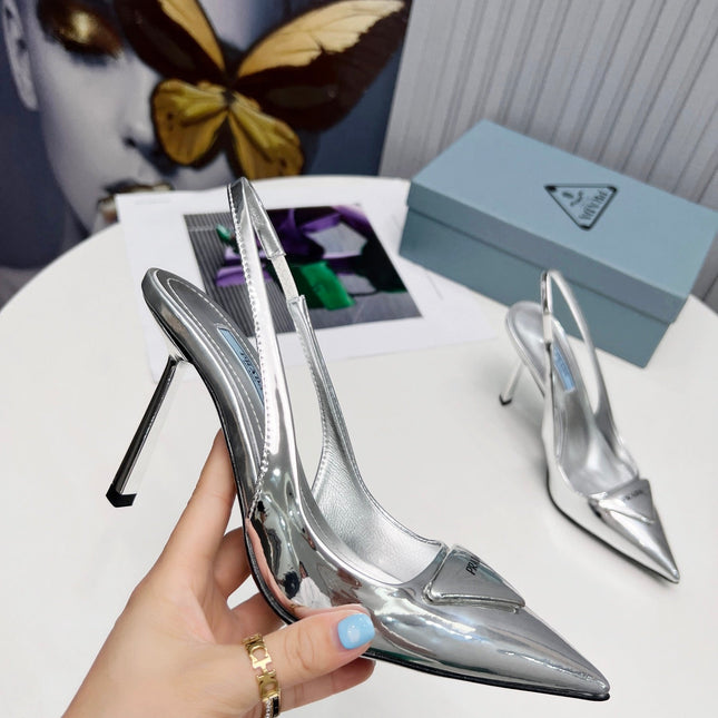 PRADA 26S SLINGBACK PUMPS STILETTO HEEL 95MM IN SILVER PATENT CALFSKIN LOGO
