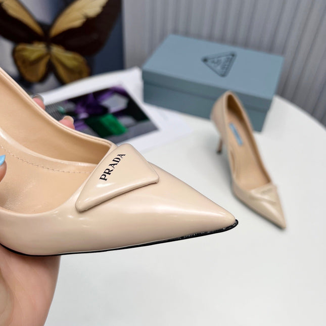 PRADA 26S POINTED TOE PUMPS STILETTO HEEL 95MM IN NUDE BEIGE PATENT CALFSKIN LOGO