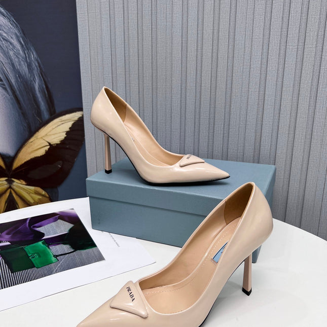 PRADA 26S POINTED TOE PUMPS STILETTO HEEL 95MM IN NUDE BEIGE PATENT CALFSKIN LOGO
