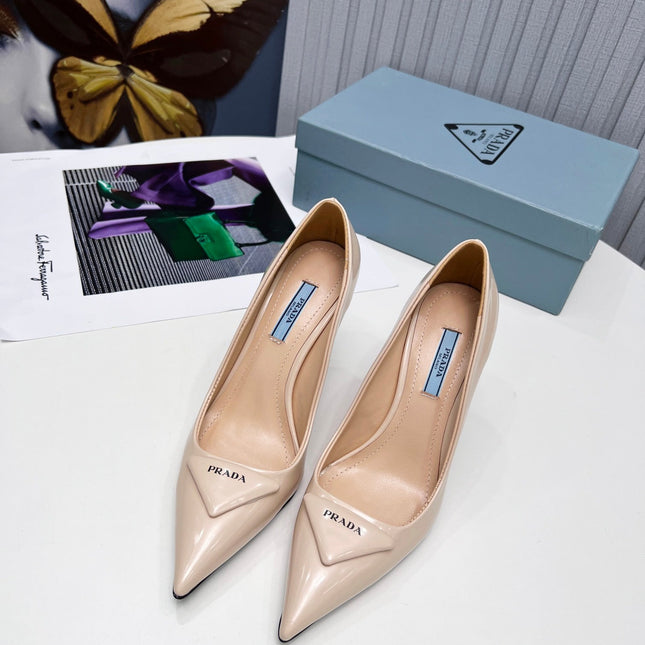 PRADA 26S POINTED TOE PUMPS STILETTO HEEL 95MM IN NUDE BEIGE PATENT CALFSKIN LOGO