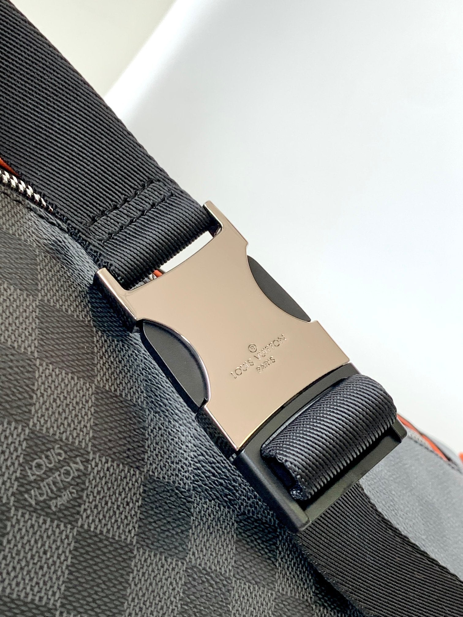 LV 25S BUMBAG 37 IN BLACK AND ORANGE COATED MONOGRAM CALFSKIN