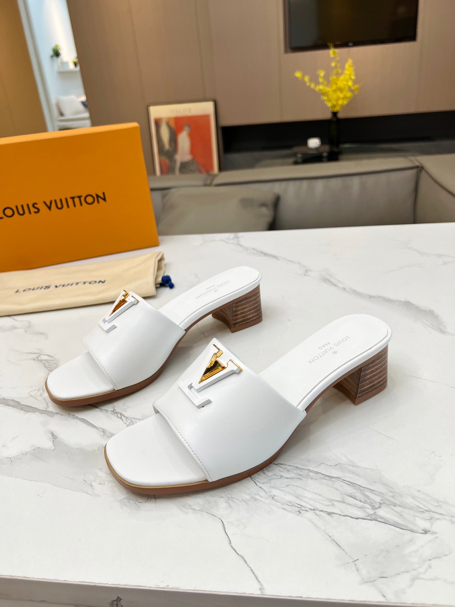 LV 26S CAPRI HIGH-HEELED MULES IN WHITE CALFSKIN