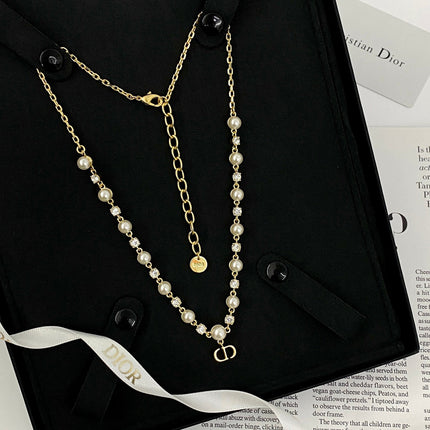 CD 26S CD LOGO PEARL & CRYSTAL BEADED CHAIN NECKLACE IN GOLD METAL 633243