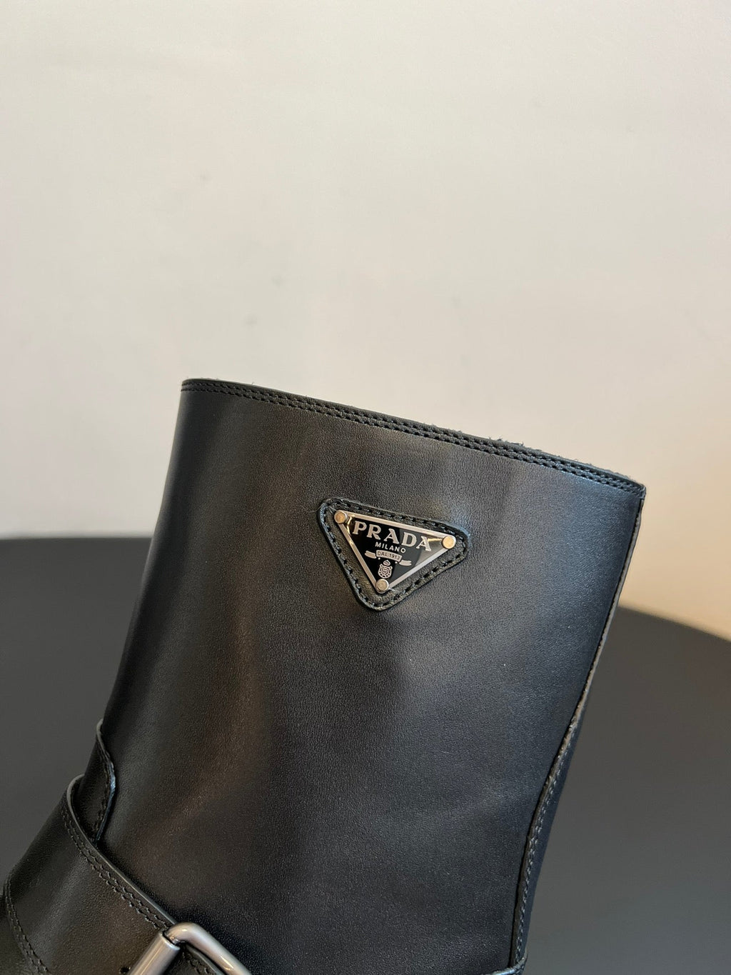 PRADA 25S PLATFORM ANKLE BOOTS IN BLACK CALFSKIN WITH SILVER HARDWARE