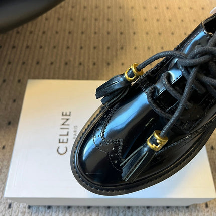 CELINE 26S SAINTNJORD TASSEL LOAFER 50 MM IN BLACK CALFSKIN