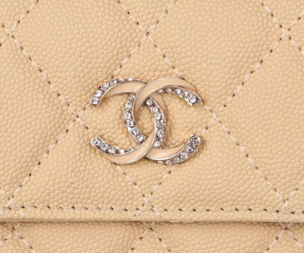 CHANEL FLAP CARD HOLDER IN BEIGE CAVIAR CALFSKIN WITH CRYSTAL EMBOSSED LOGO
