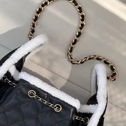 CC 25 HANDBAG 30CM IN BLACK CALFSKIN AND WHITE SHEARLING TP3
