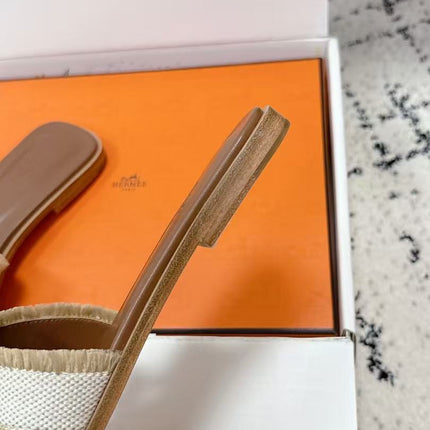 HERMES 26S ORAN FRINGED SLIDE SANDALS IN ECRU CANVAS