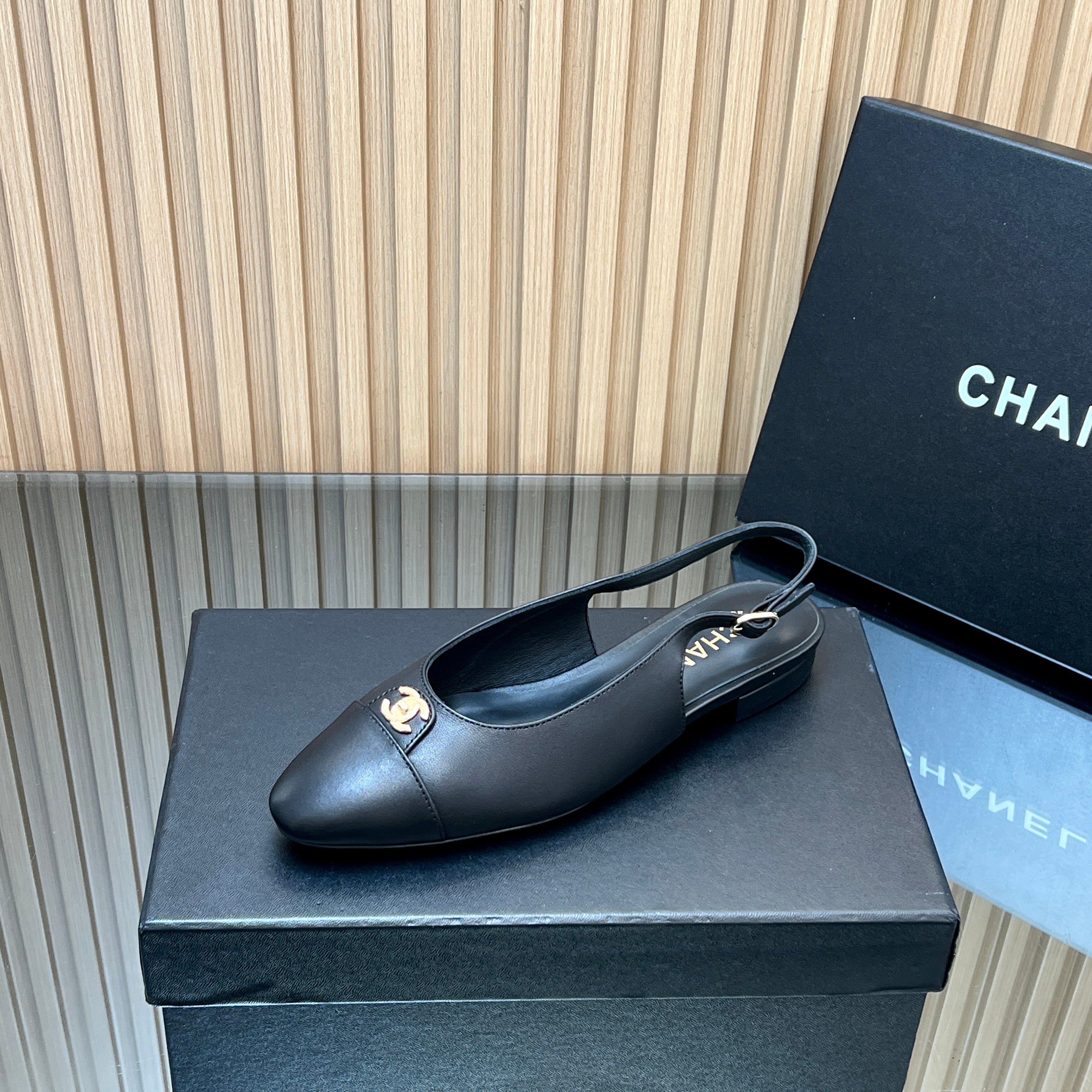 CHANEL 25S SLINGBACK FLATS IN BLACK CALFSKIN GOLD HARDWARE