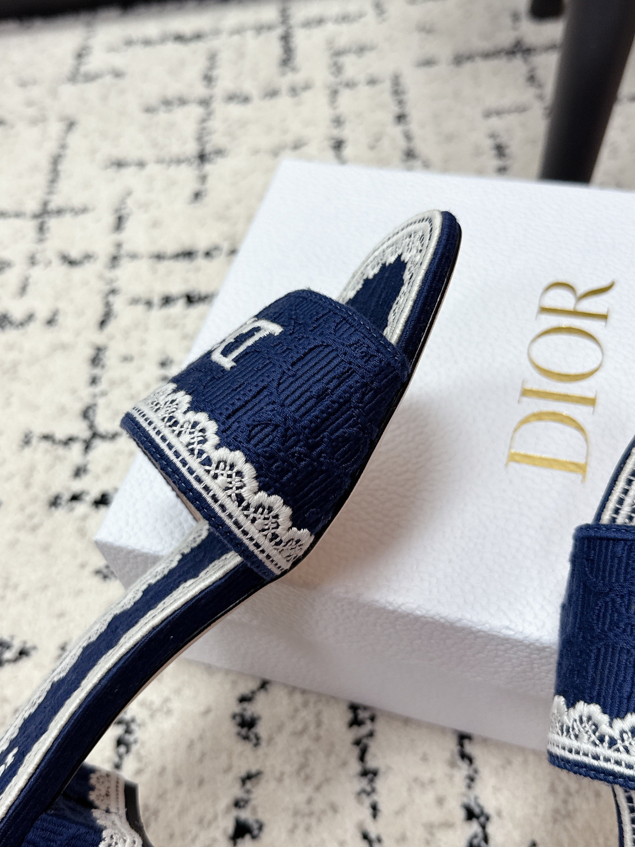 DIOR 26S HIGH HEEL SLIDES IN NAVY BLUE EMBOSSED OBLIQUE LACE EMBROIDERY