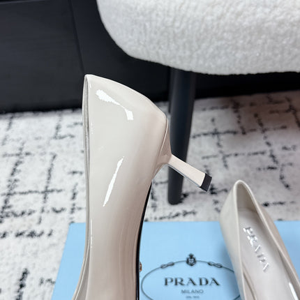 PRADA 26S POINTED-TOE HIGH HEELS 60MM IN CREAM WHITE PATENT CALFSKIN WITH LOGO