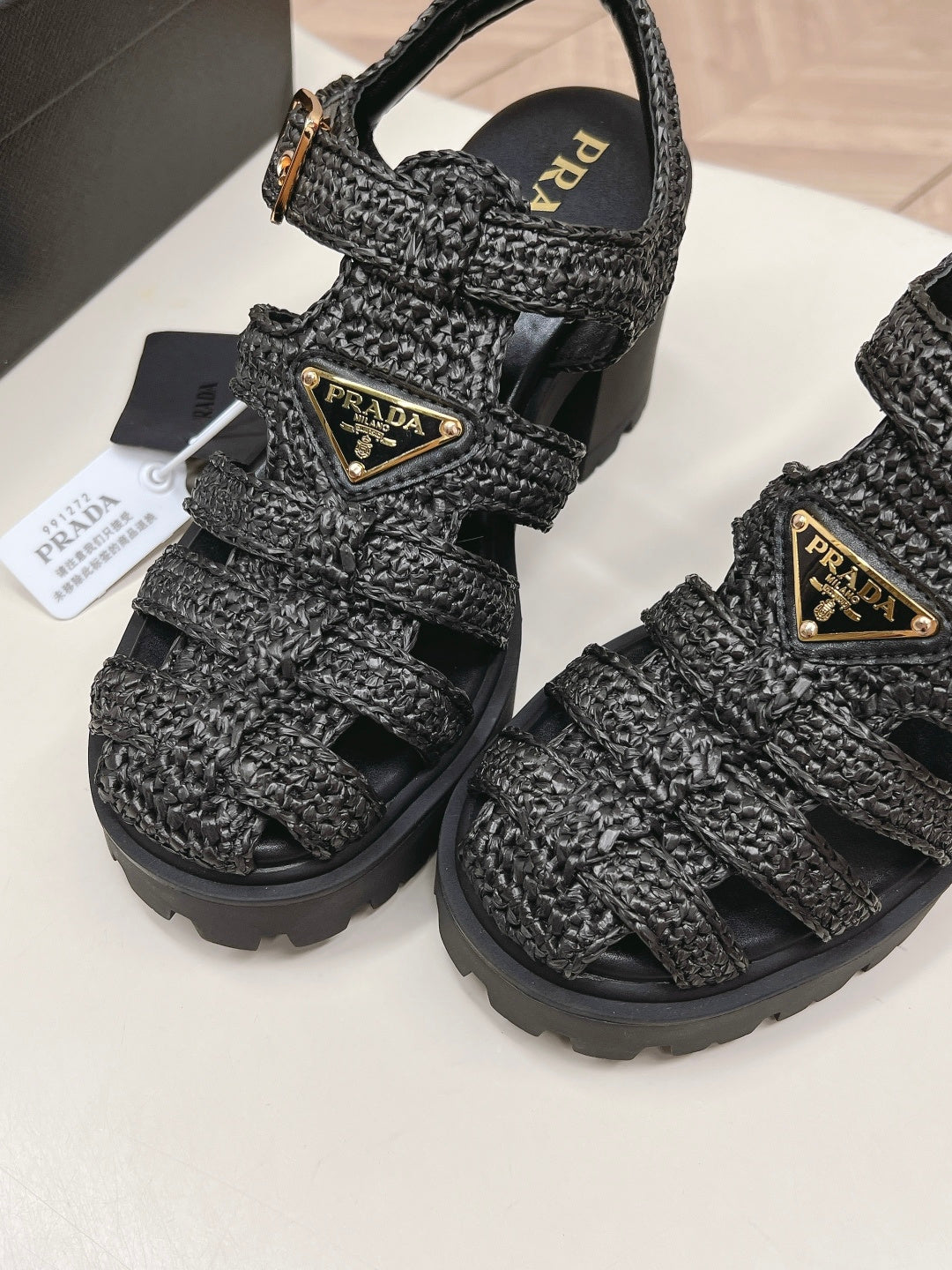 PRADA 26S HEELED FISHERMAN SANDALS IN BLACK RAFFIA AND CALFSKIN