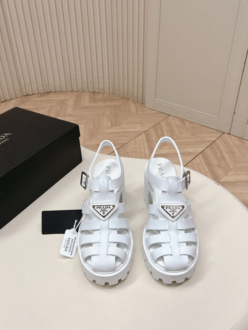 PRADA 26S CAGED PLATFORM HEEL SANDALS IN WHITE CALFSKIN