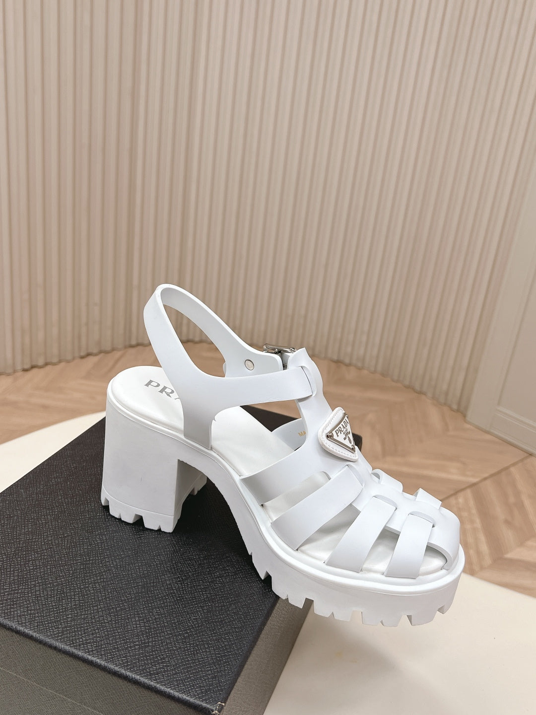 PRADA 26S CAGED PLATFORM HEEL SANDALS IN WHITE CALFSKIN