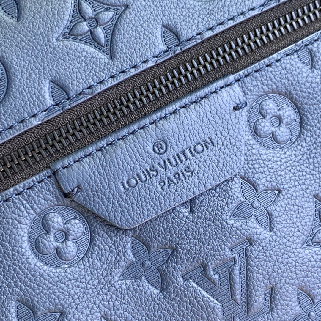 DISCOVERY PM BACKPACK 38 IN NAVY BLUE LAMBSKIN EMBOSSED MONOGRAM LOGO