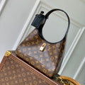 THE DROP PM 28 IN BROWN MONOGRAM COATED CANVAS AND CALFSKIN