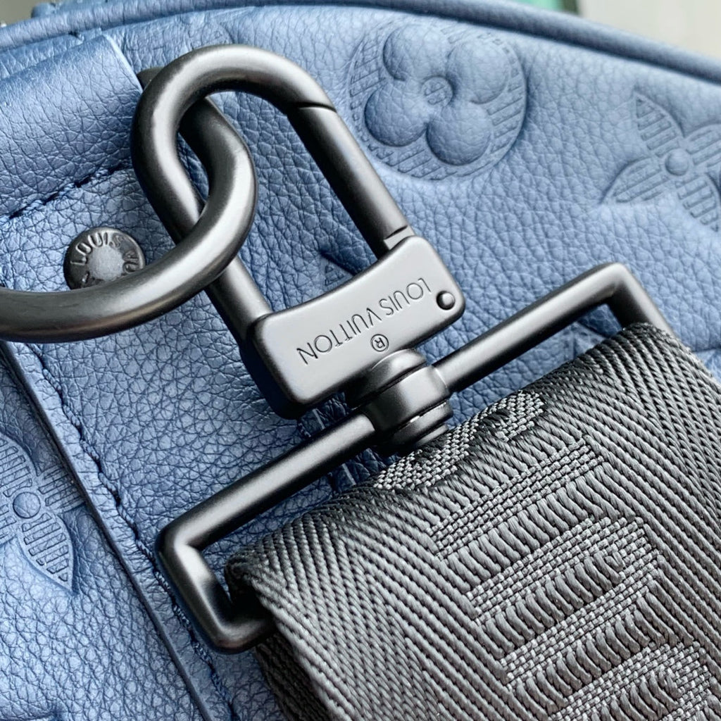 KEEPALL BANDOULIÈRE 50 IN DARK BLUE MONOGRAM SHADOW EMBOSSED CALFSKIN