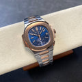 NAUTILUS STEEL AND ROSE GOLD BRACELET BLUE DIAL