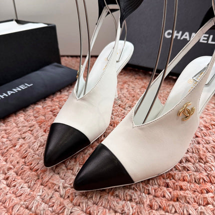 CHANEL 26S POINTED TOE HIGH HEEL SLINGBACKS IN WHITE LAMBSKIN WITH BLACK FLORAL APPLIQUE
