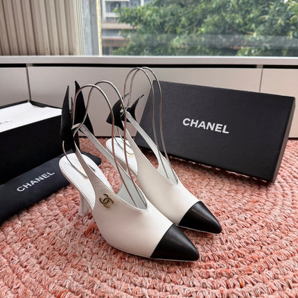 CHANEL 26S POINTED TOE HIGH HEEL SLINGBACKS IN WHITE LAMBSKIN WITH BLACK FLORAL APPLIQUE