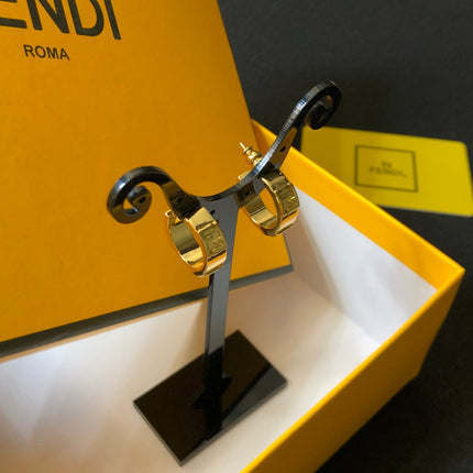 FENDI 26S FF LOGO HUGGIE HOOP EARRINGS IN GOLD TONE METAL 635065