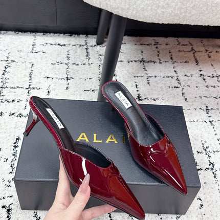 ALAIA 26S HEELED MULES 65 MM IN DARK RED GLOSSY CALFSKIN