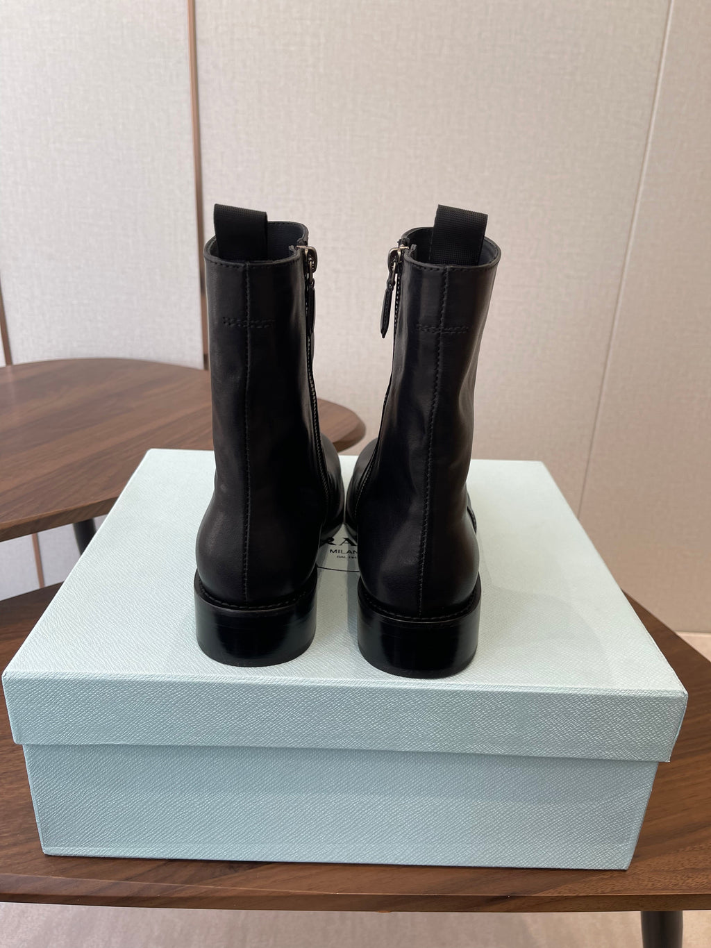 PRADA 25S COWBOY BOOTS IN DARK BLACK-BROWN CALFSKIN