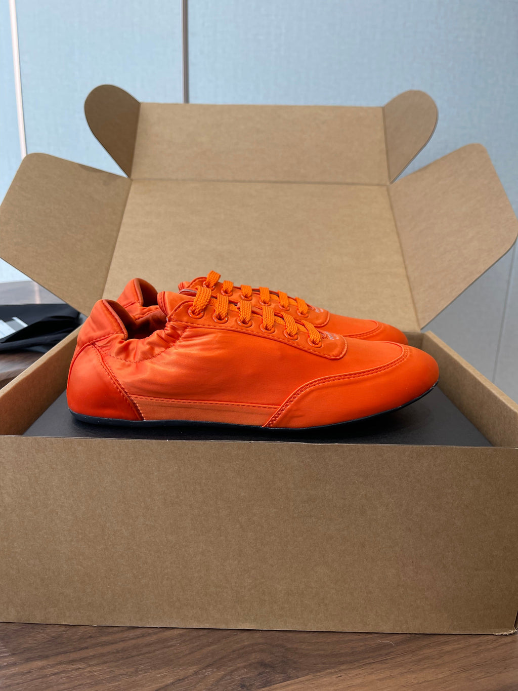 PRADA 25S SNEAKER IN ORANGE SILK