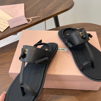 MIUMIU 26S FLIP FLOPS IN BLACK CALFSKIN