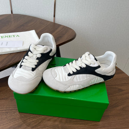 BOTTEGA VENETA 26S ORBIT FLASH SNEAKERS IN WHITE AND BLACK SUEDE