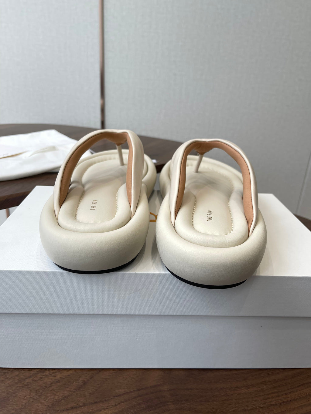 THE ROW 26S PUFFED THONG SANDALS IN IVORY WHITE CALFSKIN