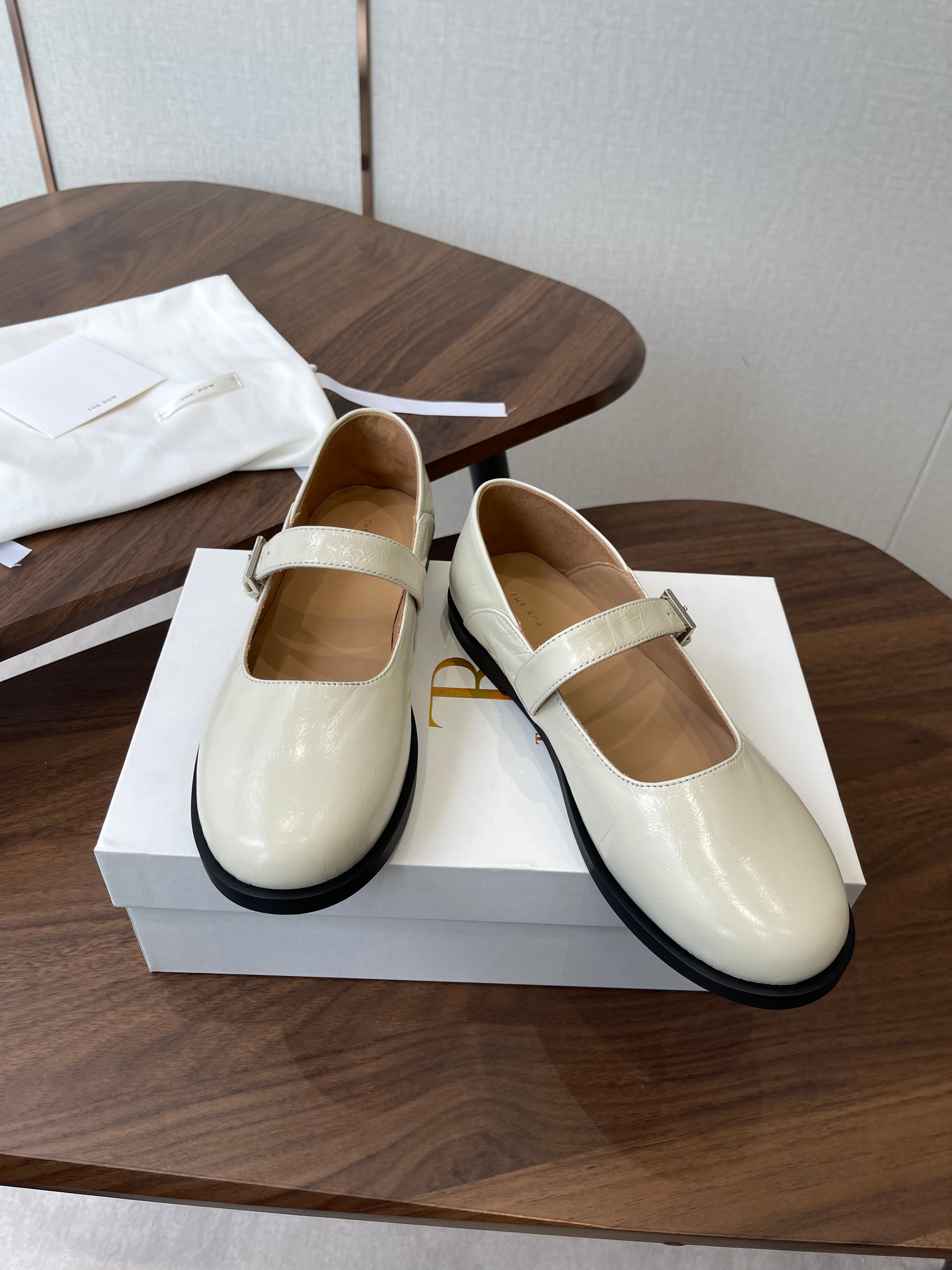 THE ROW 26S MARY JANE FLATS IN WHITE PATENT CALFSKIN