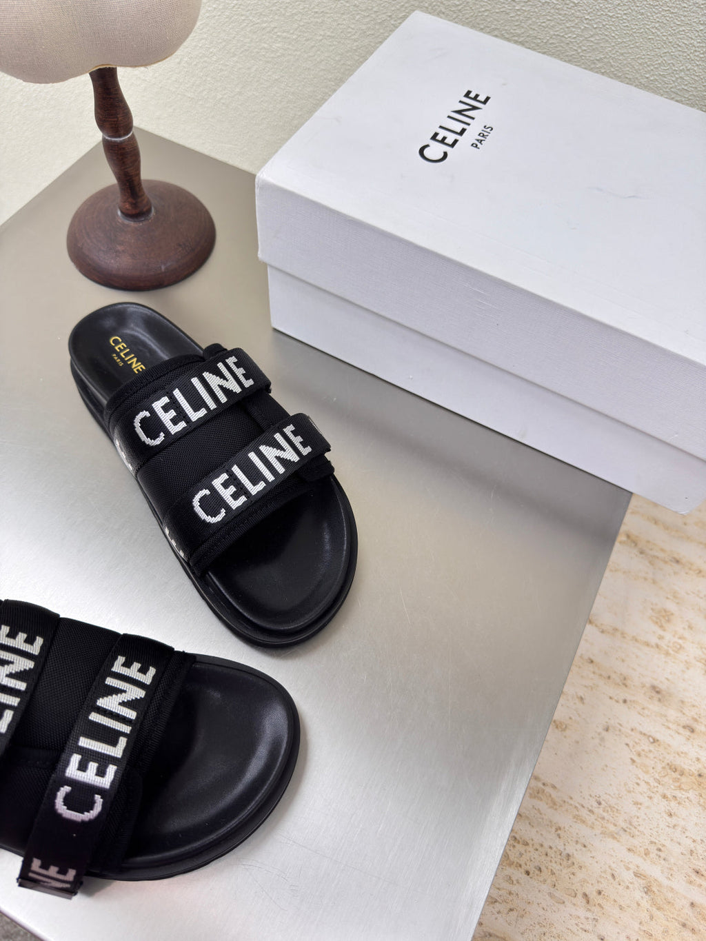 CELINE 25S FLAT SANDALS ARC DE TRIOMPHE IN BLACK CALFSKIN AND CANVAS
