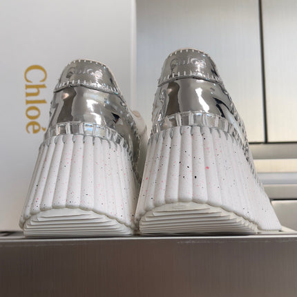 CHLOÉ 26S WEDGE SNEAKERS 70 MM IN WHITE AND SILVER CALFSKIN