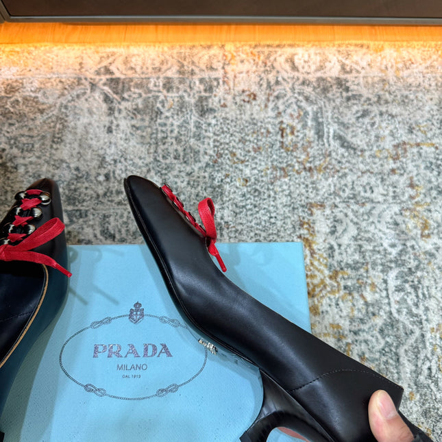 PRADA 26S  LACE UP STUDDED PUMPS 55MM IN BLACK CALFSKIN WITH RED LACES