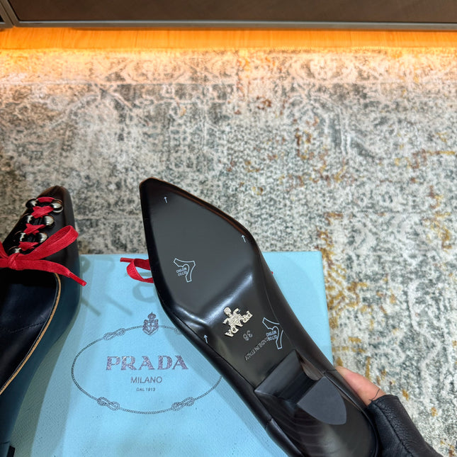 PRADA 26S  LACE UP STUDDED PUMPS 55MM IN BLACK CALFSKIN WITH RED LACES