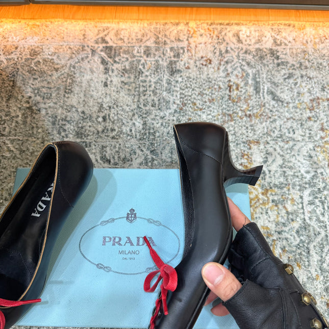 PRADA 26S  LACE UP STUDDED PUMPS 55MM IN BLACK CALFSKIN WITH RED LACES