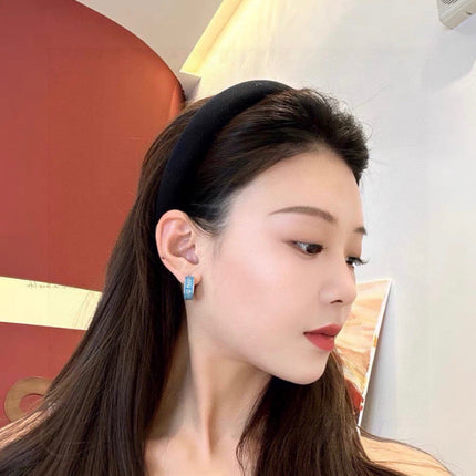 MIUMIU 26S LOGO HUGGIE HOOP EARRINGS IN LIGHT BLUE ENAMEL AND SILVER TONE METAL 622799