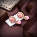 GUCCI 26S GG PINK ENAMEL HALO CRYSTAL DROP EARRINGS IN GOLD TONE METAL 624259