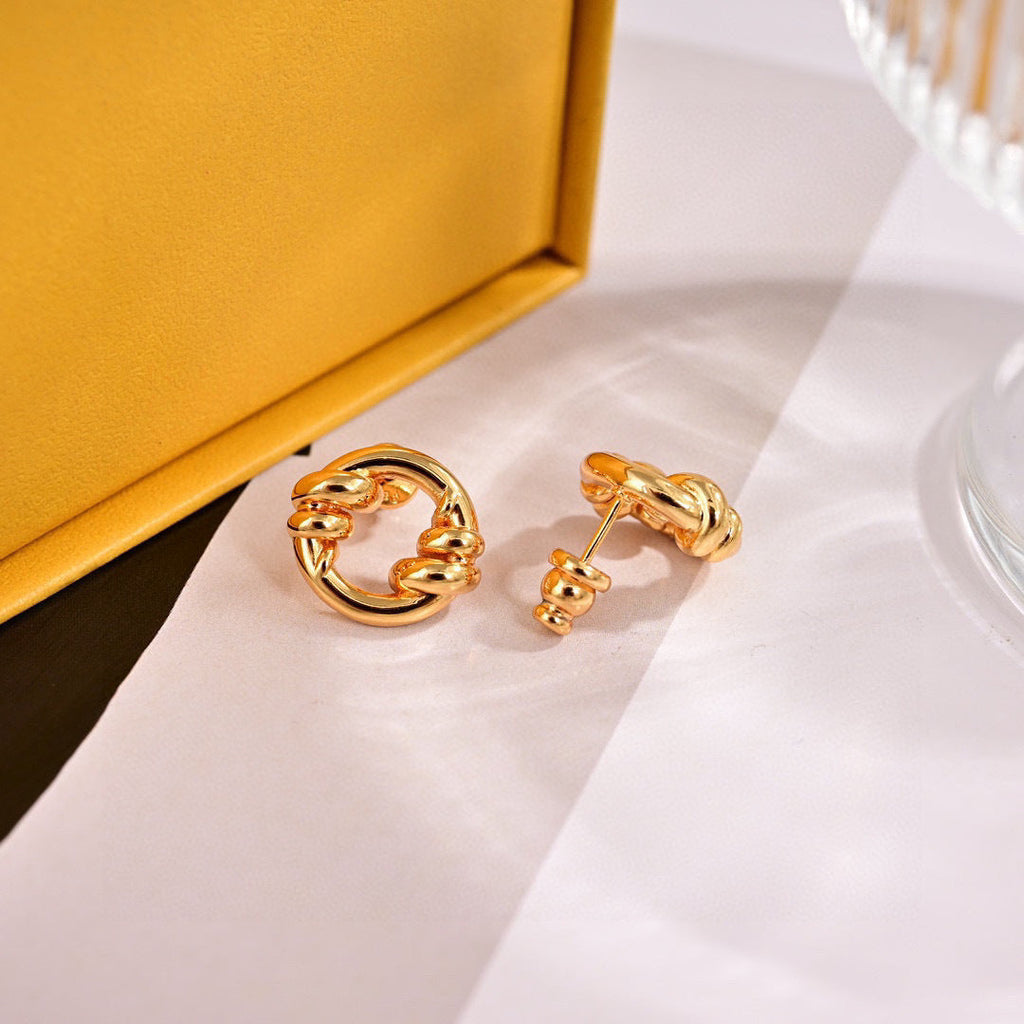 FENDI 26S KNOT HOOP EARRINGS IN GOLD TONE METAL 625596