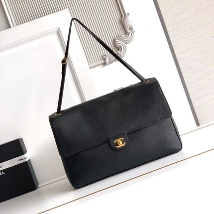 CHANEL 26S SOUPLISSIMO MAXI FLAP 39 IN BLACK GRAINED CALFSKIN GOLD HARDWARE