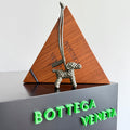 BOTTEGA VENETA 25S DOG CHARM IN GREIGE CALFSKIN