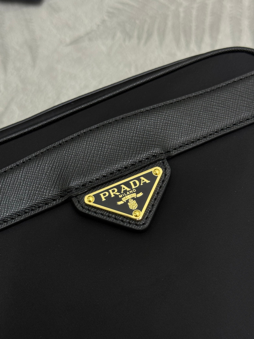PRADA 25S RE-EDITION 1978 MINI 21 IN BLACK NYLON AND SAFFIANO CALFSKIN