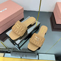 MATELASSÉ SLIDES IN DARK BEIGE CALFSKIN